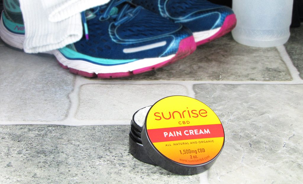 Sunrise CBD pain cream and running gear - benefits of CBD for athletes
